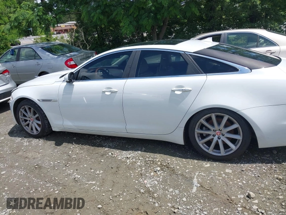 2015 Jaguar XJ with VIN SAJWA1CZ0F8V75119, listed as a IAAI auction lot 42248663 with 94,060 mi miles and . Bid and sale history available at DreamBid. Image 14.