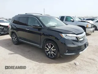 2020 Honda Pilot Touring 8-Passenger with VIN 5FNYF6H91LB003552, listed as a IAAI auction lot 41743685 with 76,725 mi miles and . Bid and sale history available at carsss.com. Image 1.