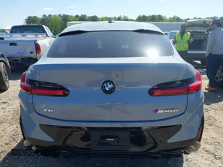 2023 BMW X4 M40i z VIN 5UX43DT06P9T36381, wystawiony jako IAAI lot #41999429 z przebiegiem 21 444 mil mil oraz . Historia ofert i sprzedaży dostępna na DreamBid. Obrazek 15.