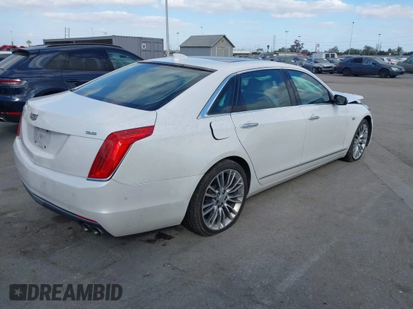 2016 Cadillac CT6 Luxury AWD with VIN 1G6KD5RSXGU154557, listed as a IAAI auction lot 41550199 with 102,536 mi miles and . Bid and sale history available at DreamBid. Image 4.