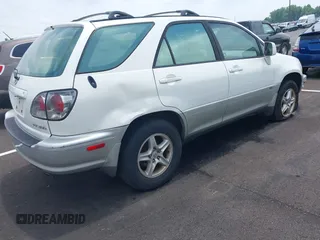 2002 Lexus RX 300 with VIN JTJGF10U220139584, listed as a IAAI auction lot 42454224 with 240,475 mi miles and . Bid and sale history available at DreamBid. Image 4.