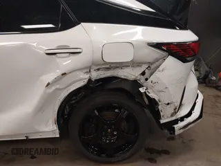 2024 Lexus RX 500h F Sport Performance z VIN 2T2BCMEAXRC014219, wystawiony jako IAAI lot #42451793 z przebiegiem 12 479 mil mil oraz . Historia ofert i sprzedaży dostępna na DreamBid. Obrazek 6.
