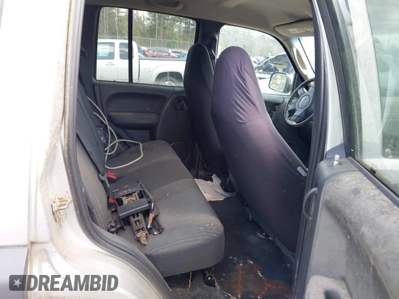 2004 Jeep Liberty Sport with VIN 1J4GL48K64W191486, listed as a IAAI auction lot 42081883 with 179,964 mi miles. Bid and sale history available at carsss.com. Image 8.