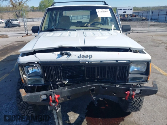 1995 Jeep Cherokee Sport with VIN 1J4FJ68S1SL576255, listed as a IAAI auction lot 42178902 with 214,041 mi miles and . Bid and sale history available at DreamBid. Image 6.