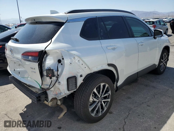 2022 Toyota Corolla Cross XLE z VIN 7MUDAABG7NV029746, wystawiony jako Copart lot #57632995 z przebiegiem 26 262 mil mil oraz Szkoda całkowita • Salvage title. Historia ofert i sprzedaży dostępna na DreamBid. Obrazek 3.
