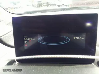 2014 BMW i3 with VIN WBY1Z4C53EV272852, listed as a IAAI auction lot 40131624 with 38,490 mi miles. Bid and sale history available at carsss.com. Image 7.