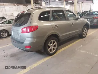 2009 Hyundai Santa Fe SE with VIN 5NMSH73EX9H233513, listed as a IAAI auction lot 42272756 with 155,262 mi miles and . Bid and sale history available at DreamBid. Image 4.