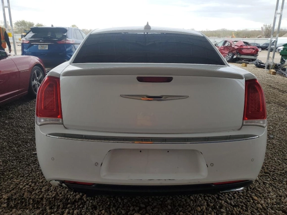 2015 Chrysler 300 C with VIN 2C3CCAET8FH829999, listed as a Copart auction lot 77652174 with Not Provided miles and Clean Title. Bid and sale history available at DreamBid. Image 6.
