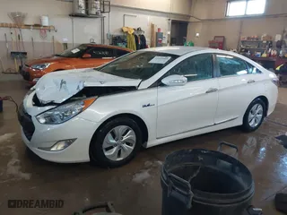 2014 Hyundai Sonata Hybrid with VIN KMHEC4A42EA117405, listed as a IAAI auction lot 41157185 with 74,225 mi miles. Bid and sale history available at carsss.com. Image 2.