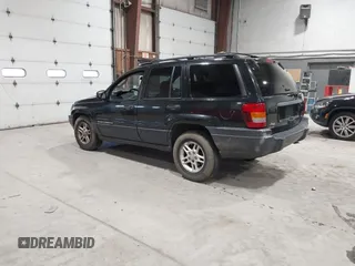 2003 Jeep Grand Cherokee Laredo with VIN 1J4GW48S63C552366, listed as a IAAI auction lot 41861501 with 227,464 mi miles. Bid and sale history available at carsss.com. Image 3.