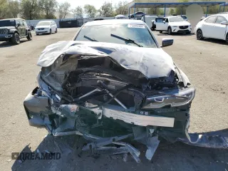 2021 BMW 3 Series 330i with VIN 3MW5R1J02M8B49793, listed as a Copart auction lot 75088384 with 42,281 mi miles and Salvage Title. Bid and sale history available at carsss.com. Image 5.