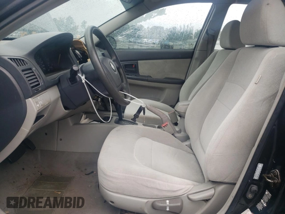 2005 Kia Spectra LX with VIN KNAFE121055134568, listed as a Copart auction lot 71541244 with 146,751 mi miles and Salvage Title. Bid and sale history available at carsss.com. Image 7.