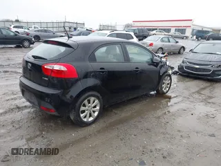 2012 Kia Rio EX with VIN KNADN5A39C6013756, listed as a IAAI auction lot 41560330 with 157,365 mi miles. Bid and sale history available at carsss.com. Image 4.