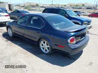 2002 Nissan Maxima GXE with VIN JN1DA31D92T408633, listed as a IAAI auction lot 42804201 with 199,403 mi miles and . Bid and sale history available at DreamBid. Image 3.