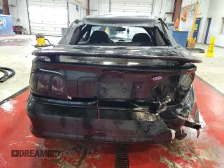 1994 Ford Mustang z VIN 1FALP45T1RF233274, wystawiony jako Copart lot #87431454 z przebiegiem Nie podano mil oraz Szkoda całkowita • Salvage title. Historia ofert i sprzedaży dostępna na DreamBid. Obrazek 6.