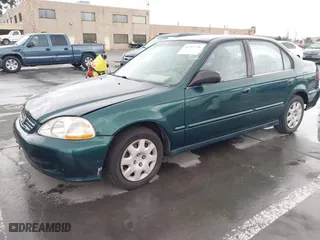 1999 Honda Civic VP with VIN 2HGEJ6618XH579736, listed as a IAAI auction lot 41912296 with 268,631 mi miles. Bid and sale history available at carsss.com. Image 2.