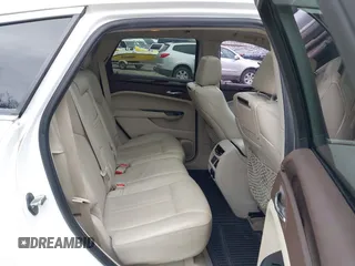 2014 Cadillac SRX Premium Collection z VIN 3GYFNDE34ES548826, wystawiony jako IAAI lot #40792942 z przebiegiem 115 984 mil mil oraz . Historia ofert i sprzedaży dostępna na DreamBid. Obrazek 8.
