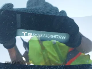 2021 Tesla Model 3 Standard Range Plus z VIN 5YJ3E1EA5MF939299, wystawiony jako IAAI lot #42146702 z przebiegiem 43 382 mil mil oraz . Historia ofert i sprzedaży dostępna na DreamBid. Obrazek 9.