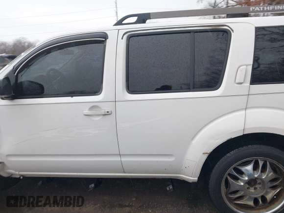 2005 Nissan Pathfinder SE with VIN 5N1AR18U15C734896, listed as a IAAI auction lot 41038342 with 188,910 mi miles. Bid and sale history available at carsss.com. Image 14.