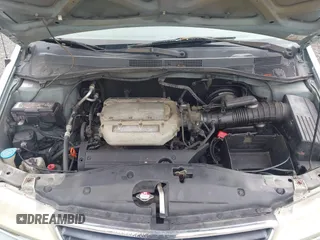 2004 Honda Odyssey EX-L with VIN 5FNRL18974B036430, listed as a IAAI auction lot 42715287 with 230,646 mi miles and . Bid and sale history available at DreamBid. Image 10.
