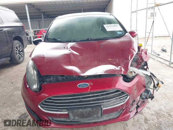 2017 Ford Fiesta SE z VIN 3FADP4BJ9HM159284, wystawiony jako IAAI lot #41291003 z przebiegiem 79 668 mil mil oraz . Historia ofert i sprzedaży dostępna na DreamBid. Obrazek 13.