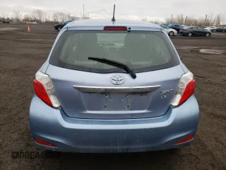 2012 Toyota Yaris L with VIN JTDKTUD33CD517298, listed as a Copart auction lot 52099335 with Not Provided miles and Salvage Title. Bid and sale history available at DreamBid. Image 6.