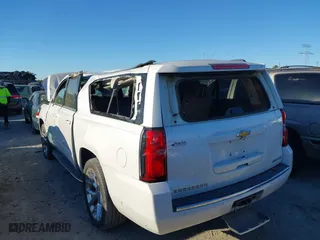 2019 Chevrolet Suburban Premier with VIN 1GNSCJKC0KR293658, listed as a IAAI auction lot 40563834 with 153,619 mi miles. Bid and sale history available at carsss.com. Image 6.