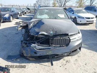 2021 BMW 5 Series 530i xDrive with VIN WBA13BJ06MCF66402, listed as a IAAI auction lot 41760543 with 93,002 mi miles and . Bid and sale history available at carsss.com. Image 6.