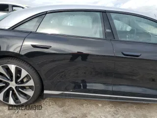 2022 Lucid Air Grand Touring z VIN 50EA1GBA6NA001280, wystawiony jako Copart lot #74004994 z przebiegiem Nie podano mil oraz Szkody całkowita. Historia ofert i sprzedaży dostępna na DreamBid. Obrazek 10.