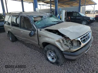 1998 Ford Explorer XL z VIN 1FMZU34E4WUA14628, wystawiony jako Copart lot #47477325 z przebiegiem 88 954 mil mil oraz Szkoda całkowita • Salvage title. Historia ofert i sprzedaży dostępna na DreamBid. Obrazek 4.