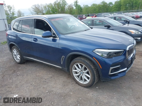 2022 BMW X5 xDrive40i z VIN 5UXCR6C08N9J99866, wystawiony jako IAAI lot #42215532 z przebiegiem 53 484 mil mil oraz . Historia ofert i sprzedaży dostępna na DreamBid. Obrazek 1.