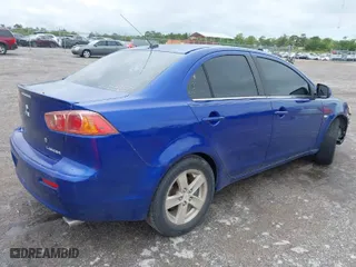 2008 Mitsubishi Lancer DE with VIN JA3AU26U68U037460, listed as a IAAI auction lot 41979573 with 220,238 mi miles. Bid and sale history available at carsss.com. Image 4.