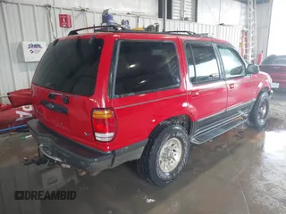 1998 Ford Explorer XLT z VIN 1FMZU35P3WUA50049, wystawiony jako IAAI lot #42239678 z przebiegiem 159 126 mil mil oraz . Historia ofert i sprzedaży dostępna na DreamBid. Obrazek 4.