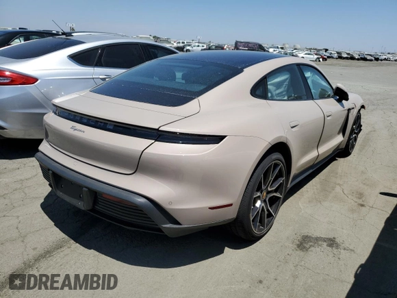 2024 Porsche Taycan z VIN WP0AA2Y1XRSA10095, wystawiony jako Copart lot #60040284 z przebiegiem 1 732 mil mil oraz Szkoda całkowita • Salvage title. Historia ofert i sprzedaży dostępna na DreamBid. Obrazek 3.