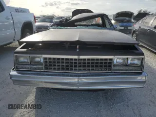 1985 Chevrolet El Camino with VIN 3GCCW80H6FS907000, listed as a Copart auction lot 77158584 with 65,054 mi miles and Salvage Title. Bid and sale history available at carsss.com. Image 5.