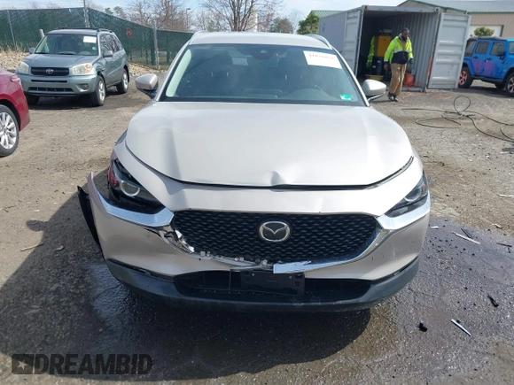 2022 Mazda CX-30 S Select with VIN 3MVDMBBL4NM401563, listed as a IAAI auction lot 41826878 with 4,733 mi miles and . Bid and sale history available at carsss.com. Image 12.