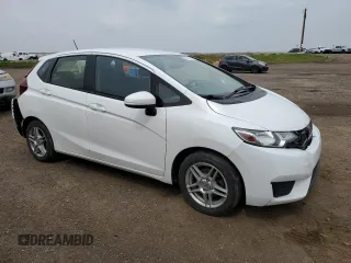 2016 Honda Fit LX with VIN JHMGK5H59GX004764, listed as a Copart auction lot 65131715 with 75,726 mi miles and Salvage title. Bid and sale history available at DreamBid. Image 4.