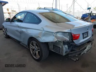 2014 BMW 4 Series 428i with VIN WBA3N7C58EF719514, listed as a IAAI auction lot 42310537 with 82,573 mi miles and . Bid and sale history available at DreamBid. Image 3.