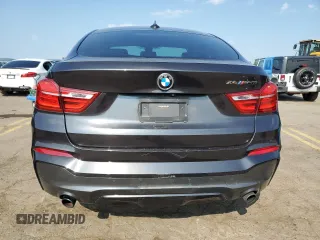 2018 BMW X4 M40i with VIN 5UXXW7C55J0W64498, listed as a Copart auction lot 58873794 with 144,148 mi miles and Salvage Title. Bid and sale history available at carsss.com. Image 6.