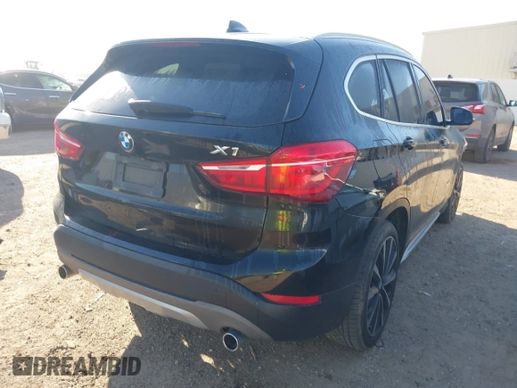 2018 BMW X1 sDrive28i with VIN WBXHU7C30J5L04913, listed as a IAAI auction lot 41755344 with 101,867 mi miles. Bid and sale history available at carsss.com. Image 4.