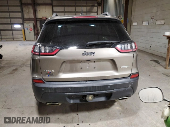 2021 Jeep Cherokee 80th Anniversary with VIN 1C4PJMMX2MD225223, listed as a Copart auction lot 42536315 with 76,556 mi miles and Salvage Title. Bid and sale history available at carsss.com. Image 6.