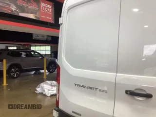 2020 Ford Transit Cargo with VIN 1FTBR1CG6LKB75357, listed as a IAAI auction lot 42243287 with 100,958 mi miles and . Bid and sale history available at DreamBid. Image 1.