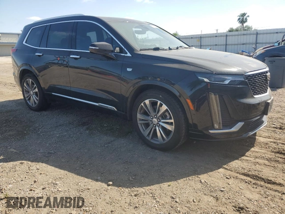 2021 Cadillac XT6 Premium Luxury with VIN 1GYKPCRS4MZ199110, listed as a Copart auction lot 51798905 with 66,486 mi miles and Salvage Title. Bid and sale history available at DreamBid. Image 4.