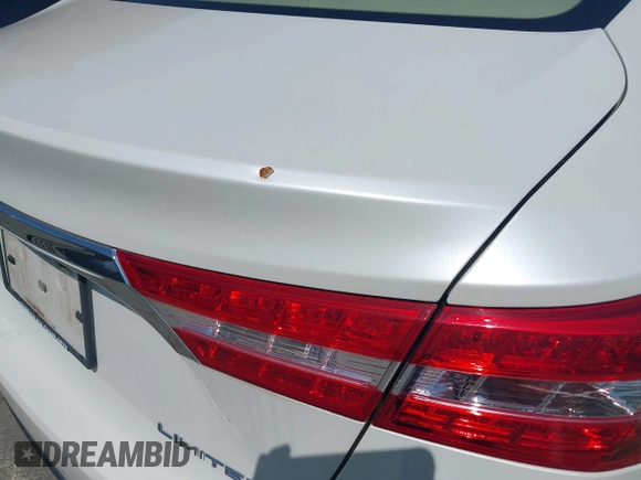 2014 Toyota Avalon Limited with VIN 4T1BK1EB0EU122498, listed as a IAAI auction lot 40248080 with 126,818 mi miles and . Bid and sale history available at DreamBid. Image 18.