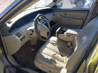 2004 Toyota Avalon XL with VIN 4T1BF28B74U343522, listed as a IAAI auction lot 41823601 with 146,181 mi miles and . Bid and sale history available at DreamBid. Image 5.