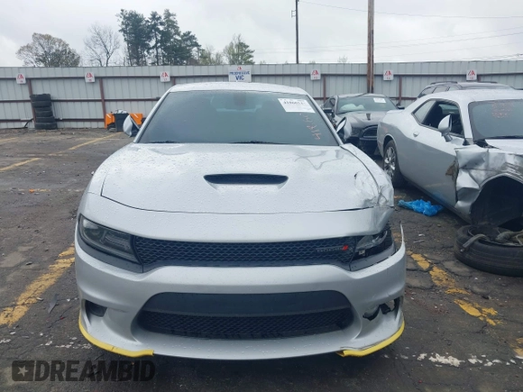 2019 Dodge Charger R/T with VIN 2C3CDXCTXKH757197, listed as a IAAI auction lot 41860544 with 98,820 mi miles and . Bid and sale history available at DreamBid. Image 12.