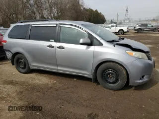 2014 Toyota Sienna L with VIN 5TDZK3DC7ES489962, listed as a Copart auction lot 48117985 with 329,366 mi miles and Clean Title. Bid and sale history available at carsss.com. Image 4.