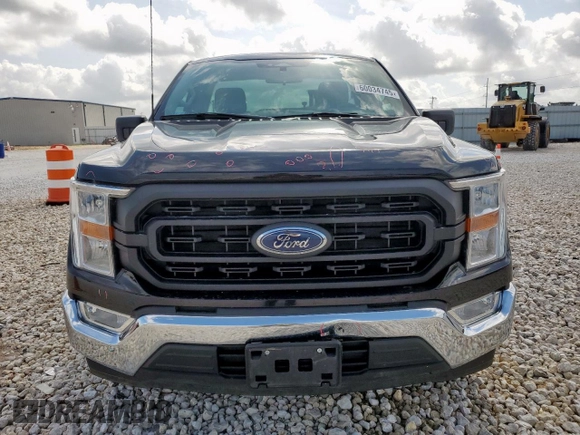 2022 Ford F-150 XL with VIN 1FTMF1C59NKF26135, listed as a Copart auction lot 60034745 with 57,430 mi miles and Salvage title. Bid and sale history available at DreamBid. Image 5.