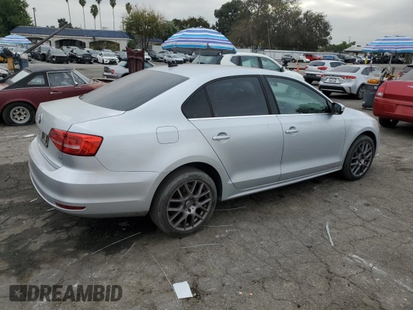 2015 Volkswagen Jetta SE with VIN 3VWD17AJ5FM260475, listed as a Copart auction lot 84764864 with 119,189 mi miles and Salvage title. Bid and sale history available at DreamBid. Image 3.