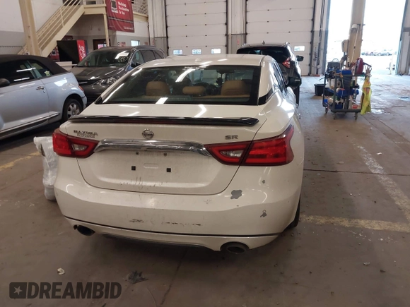 2016 Nissan Maxima SL with VIN 1N4AA6AP2GC399721, listed as a IAAI auction lot 41818252 with 64,386 mi miles and . Bid and sale history available at DreamBid. Image 16.